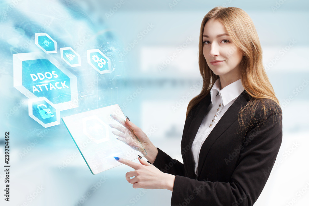 The concept of business, technology, the Internet and the network. A young entrepreneur working on a virtual screen of the future and sees the inscription: Ddos attack The concept of business, technology, the Internet and the network. A young entrepreneur working on a virtual screen of the future and sees the inscription: Ddos attack
