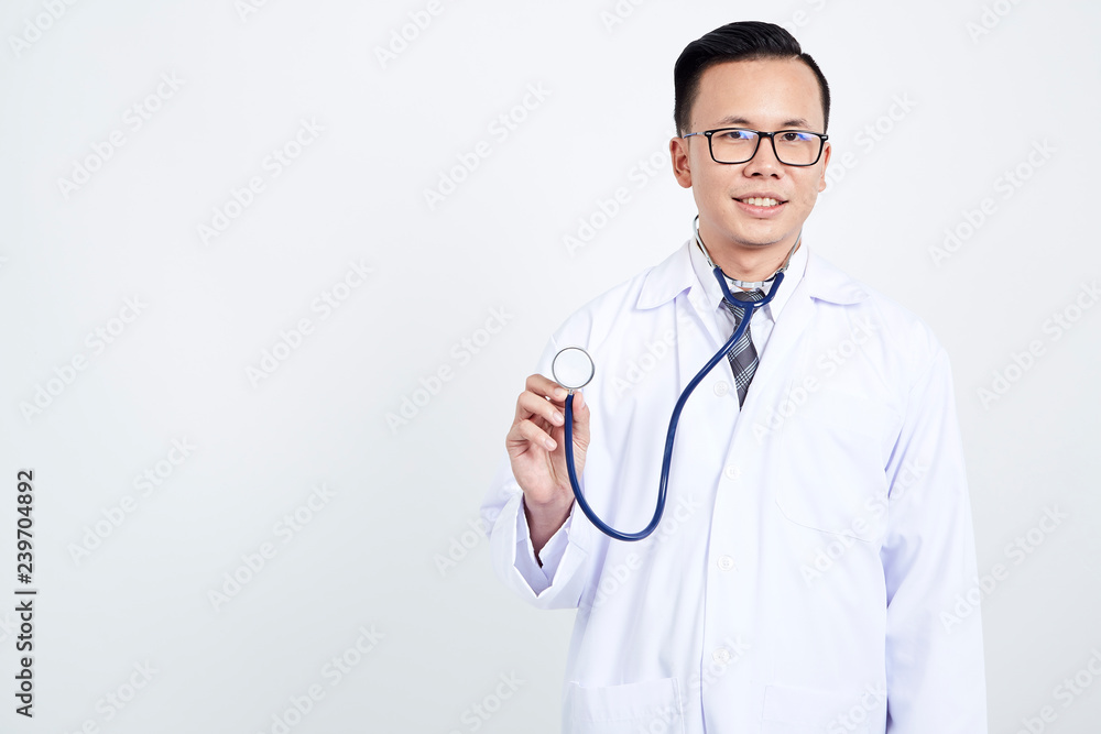 Doctor holding stethoscope on white background Doctor holding stethoscope on white background