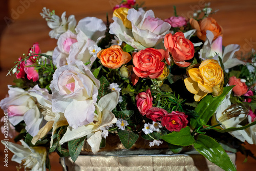 bouquets of white roses and other flowers are decorated with a festive table in the restaurant