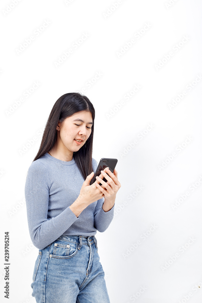 Asian woman use of the cellphone Asian woman use of the cellphone