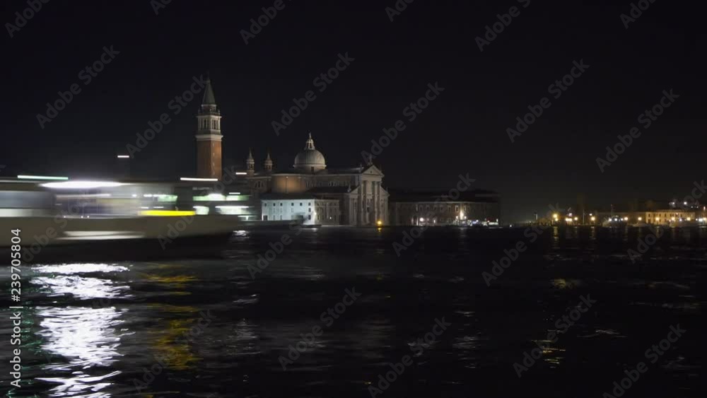 Venice night time lapse of boat traffic with San Giorgio Maggiore church in the background Venice night time lapse of boat traffic with San Giorgio Maggiore church in the background