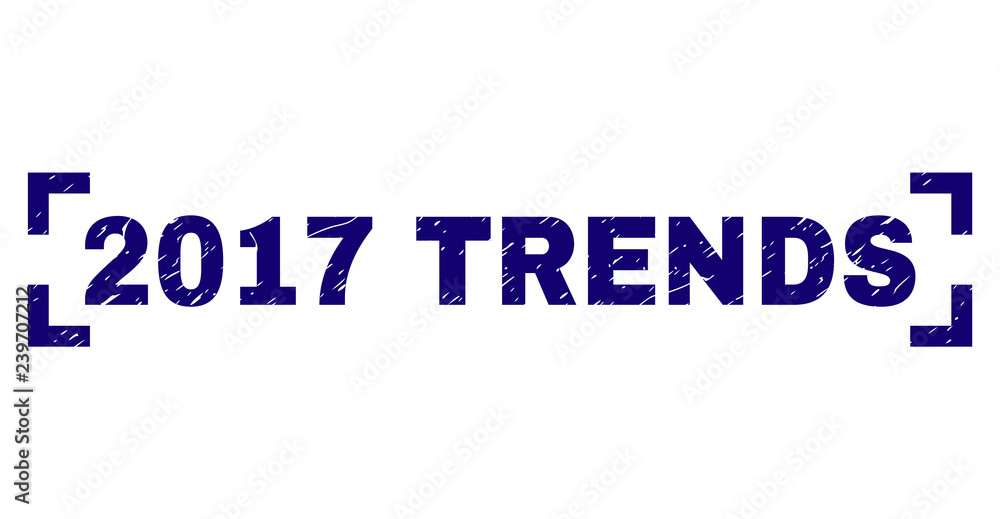 2017 TRENDS text seal print with distress effect. Text title is placed between corners. Blue vector rubber print of 2017 TRENDS with dirty texture.