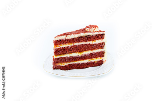 Red valvel cream cheese cake on white isolated background with copy space. photo