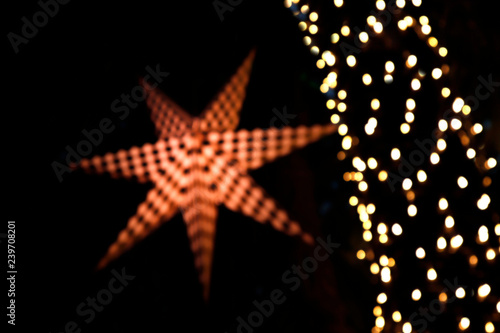 blurred bokeh light and star for decoration christmas  christmas and new year ornamental lights shine spark for background  bokeh colorful lights blur for decoration christmas festival