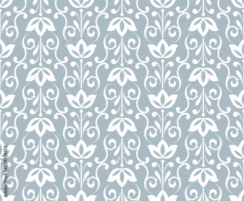 Flower geometric pattern. Seamless vector background. White and blue ornament. Ornament for fabric, wallpaper, packaging. Decorative print