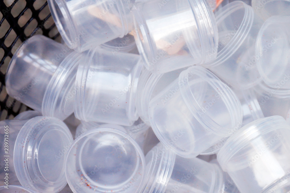 Waste plastic cups many, Garbage plastic, Plastic glass dirty, Plastic waste trash pollution in bin top view close up (selective focus) Waste plastic cups many, Garbage plastic, Plastic glass dirty, Plastic waste trash pollution in bin top view close up (selective focus)
