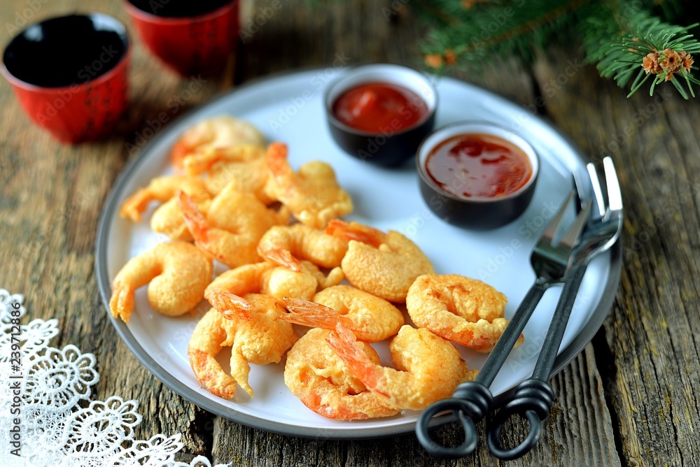 Crispy fried shrimp tails with sauces. Crispy fried shrimp tails with sauces.