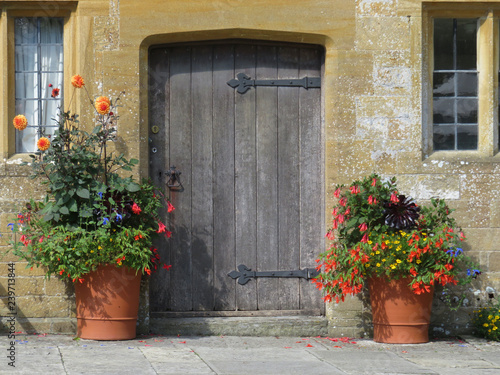 old door with flowers © psquiddy