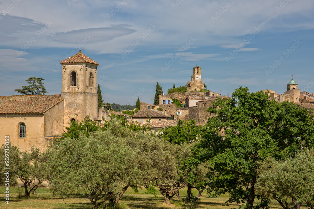 Idyllic Lourmarin. Belfry of the Protestant Church and Clock Tower in the Village of Lourmarin, Provence, Luberon, Vaucluse, France
