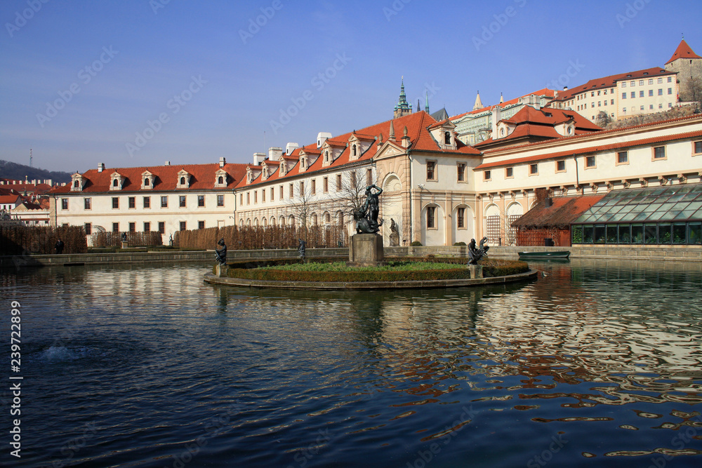 Waldstein palace garden (Valdstejnska Zahrada) and building of the Senate of Czech Republic in Prague. A pond with The Hercules' Fountain