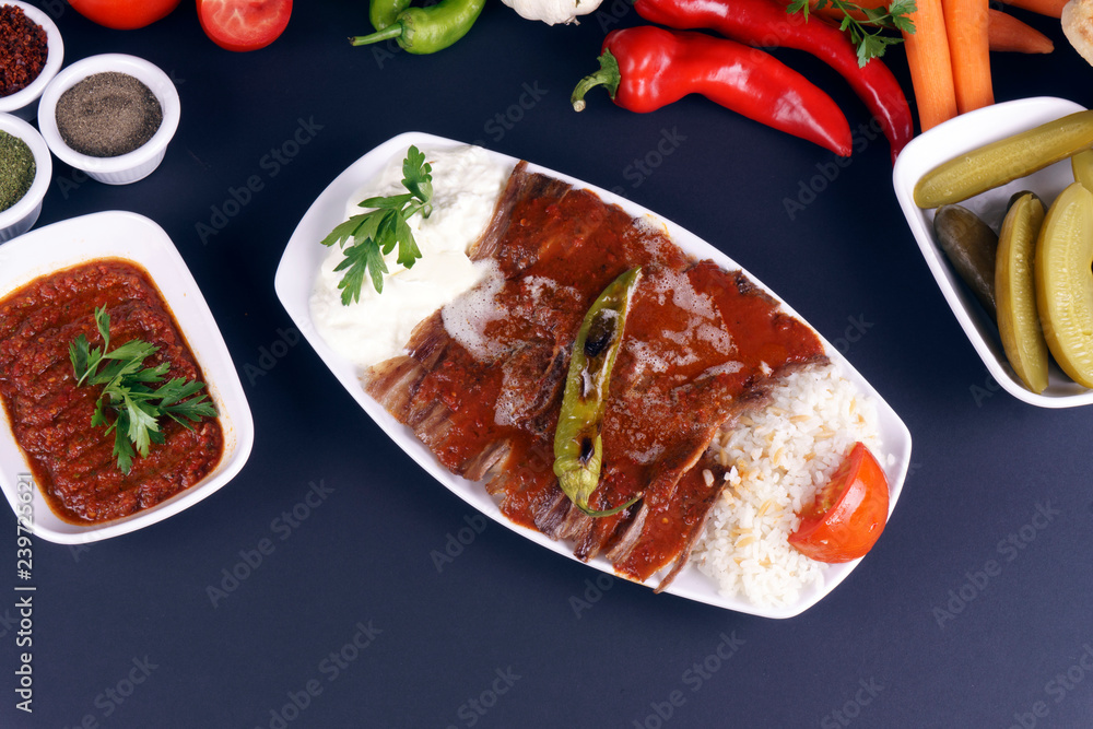 Turkish iskender kebab on dark background. Traditional flavors. Doner ...