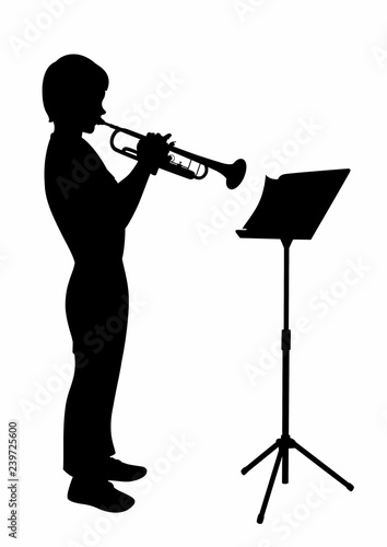 Shadow of a young trumpeter