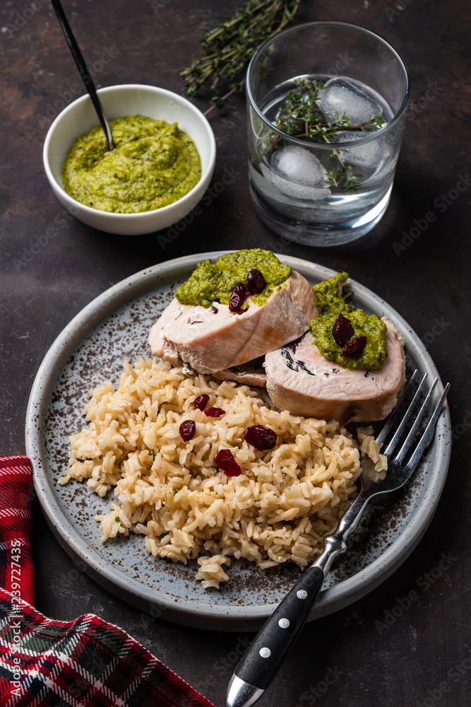 Sliced Chicken Roll with Cranberries, Pesto and Rice.