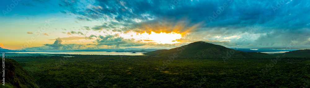 Fototapeta premium 180 degree panorama of sunrise over the rain forest of Nechisar National Park, Ethiopia.