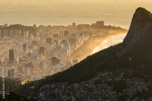 View of Favela Rocinha at Sunrise With Ipanema District Behind, in Rio de Janeiro, Brazil