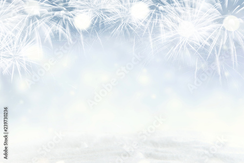 Winter Fireworks and bokeh with snowflake in New Year eve and copy space. Abstract background holiday. © oatawa