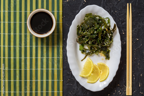 Kelp superfood with sesame, lemon and sauce photo