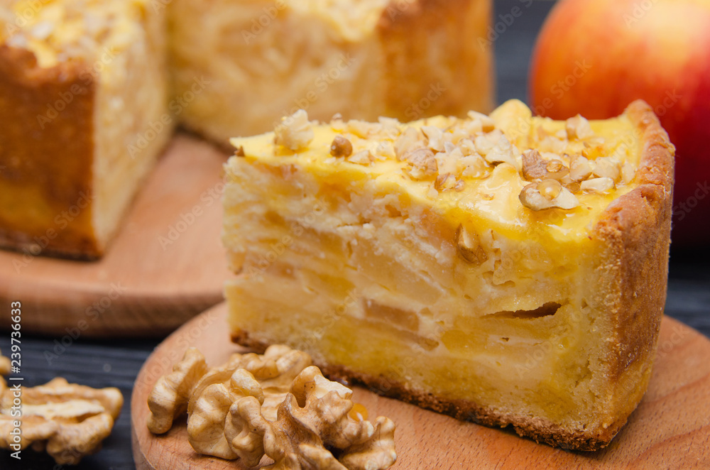 Homemade apple pie. Autumn composition with apples and pie. Autumn dessert. Piece of cake Homemade apple pie. Autumn composition with apples and pie. Autumn dessert. Piece of cake