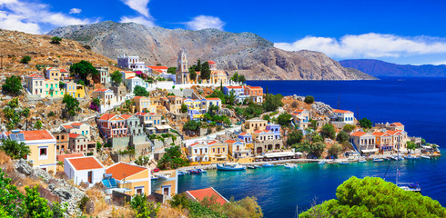 Papier peint photo Île Vue aérienne du port de Symi Grèce  © Freesurf