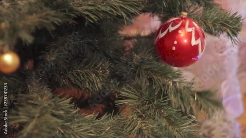 Wallpaper Mural The wind blows on a Christmas toy that hangs on the Christmas tree. Torontodigital.ca