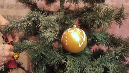 Wallpaper Mural The wind blows on a Christmas toy that hangs on the Christmas tree. Torontodigital.ca