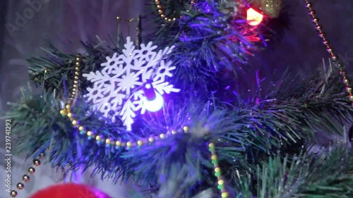 Wallpaper Mural The wind blows on a Christmas toy that hangs on the Christmas tree. Torontodigital.ca