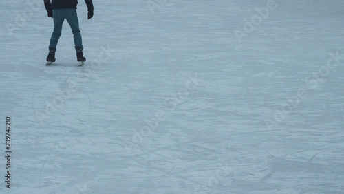 legs ride a guy skating on the ice rink