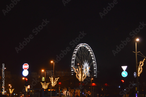 Night lights of Ferris wheel on December in Budapest on January 1, 2018.