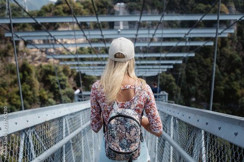  Skypark in Sochi, extreme summer jumping in the mountains. Tourist girl in skypark photo