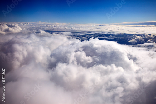 Aerial view of clouds. Flying to america