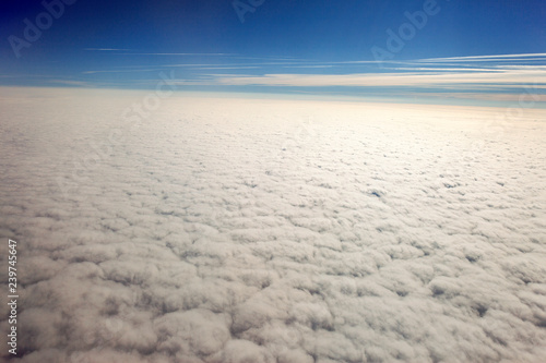 Aerial view of clouds. Flying to america © Claudio Quacquarelli