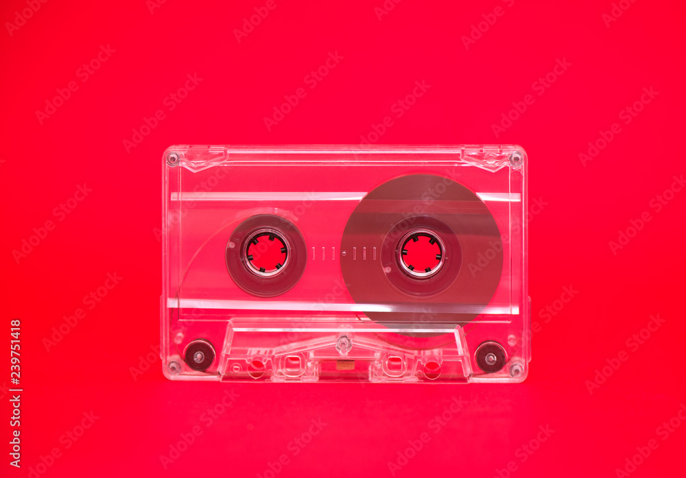Fototapeta premium Audio tape on red background