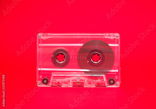 Audio tape on red background