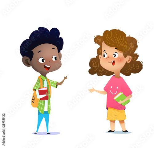 Two multiracial children studying, reading books and discuss