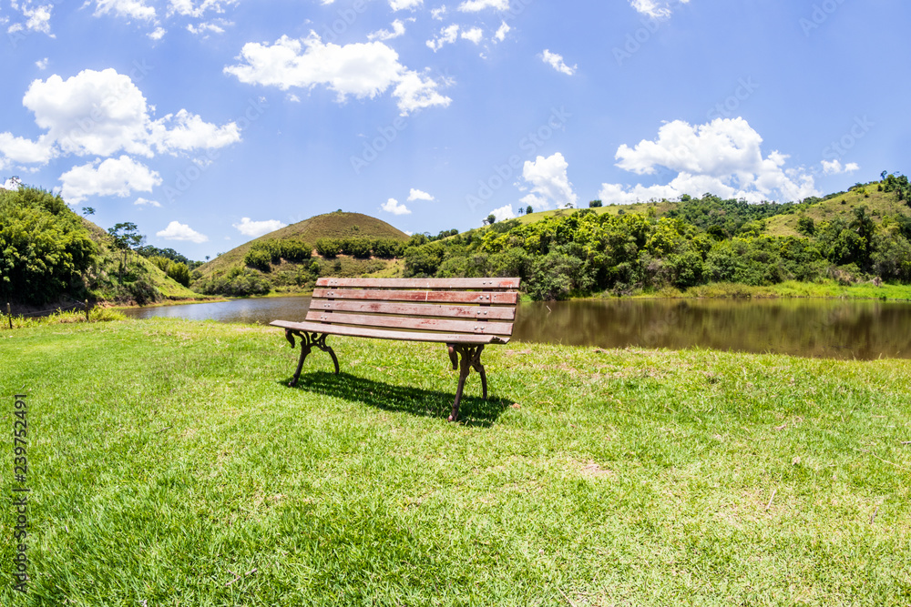 landscape, lawn with back hill and chair to the front isolated landscape, lawn with back hill and chair to the front isolated
