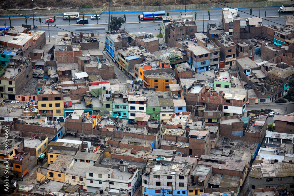 The city of Lima in Peru. Houses roads and cars