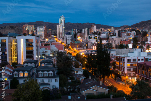 Sunset over the south area of La Paz, Bolivia. Bright lights