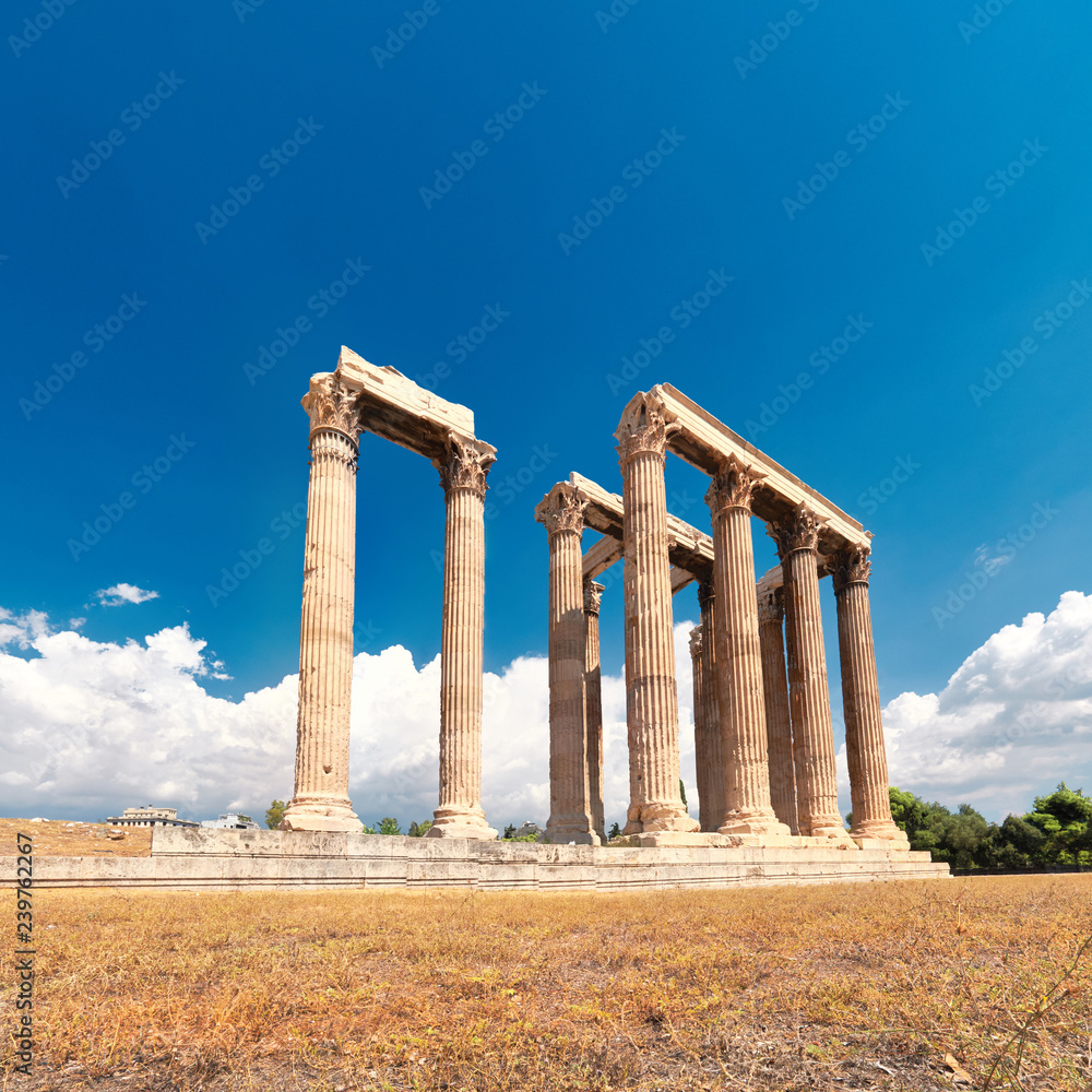 Temple of Zeus with Acropolis on the background in Athens, Greece
