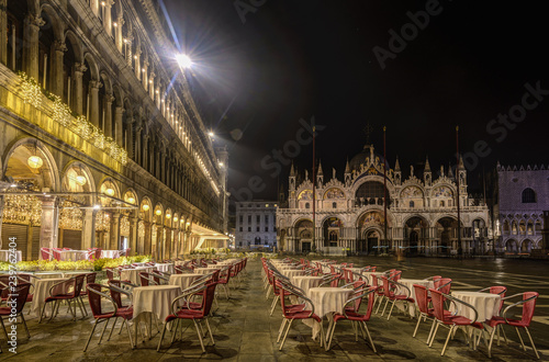 Historical buildings at misty winter night at Piazza San Marco in Venice, Italy.
