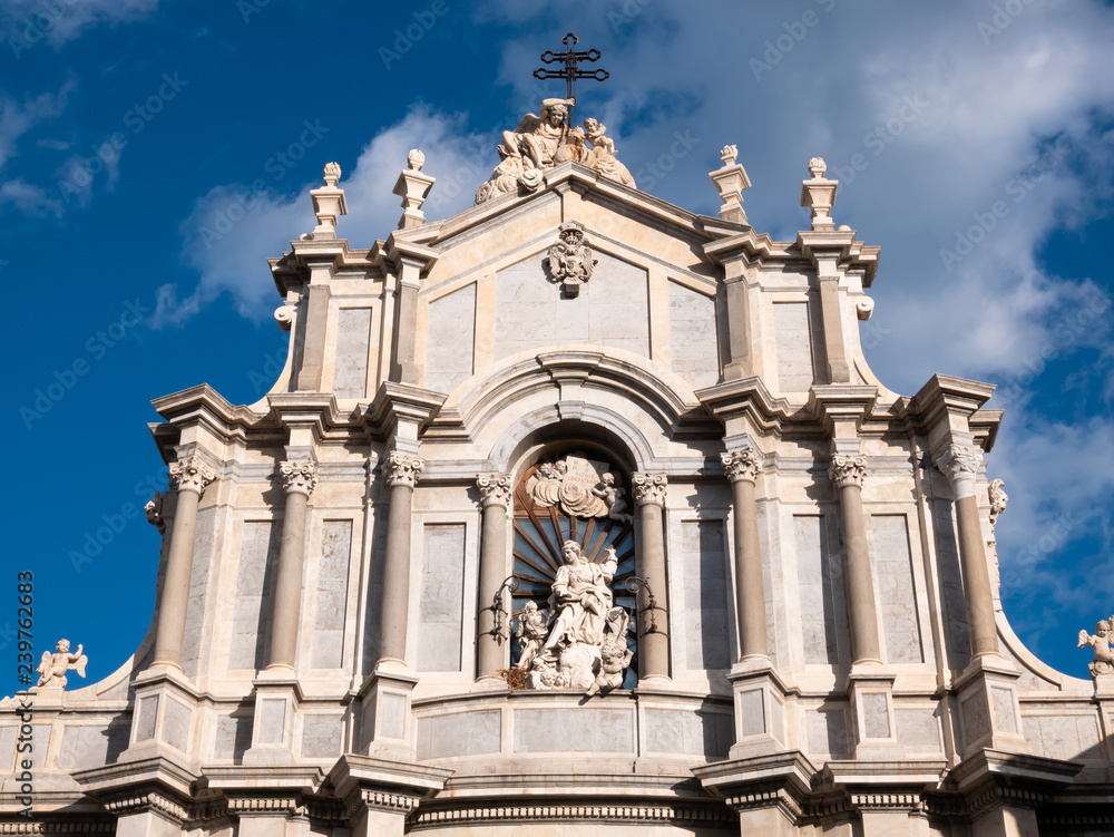 Detail of the upper part of the Cathedral of Catania, on a beautiful deep blue sky