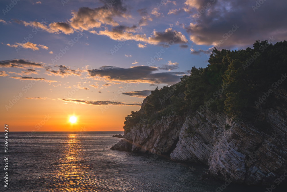 Sunset over the cliffs in Petrovac