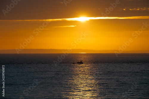 Colorful scene durning morning / Sunrise on a sea view / Seascape with sunrise reflections 
