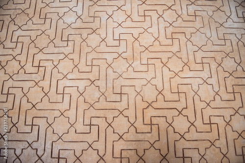 Closeup of a beautiful medieval time architecture seen inside Alhambra Palace. The architecture seems apalling and stunning with details. The design is similarly fascinating.