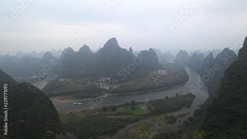 XINGPING, GUILIN, CHINA - CIRCA NOVEMBER 2018 : LANDSCAPE of GUILIN.  KARST MOUNTAIN and LI RIVER.  View from top of Xianggong mountain. photo