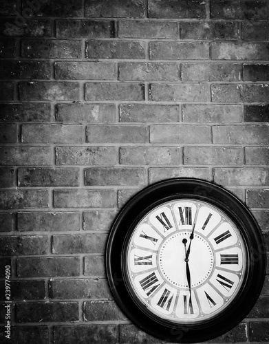 High Contrast Clock on Brick Wall photo