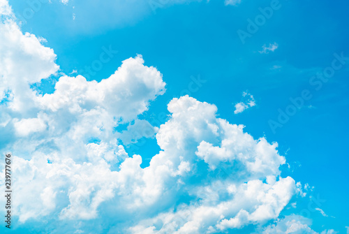 Beautiful blue sky and white cumulus clouds abstract background. Cloudscape background.  Blue sky and white clouds on sunny day. Nature weather. Bright day sky for happy day background