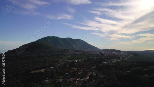 Drone flight over the landscape of Apaneca town and hills photo