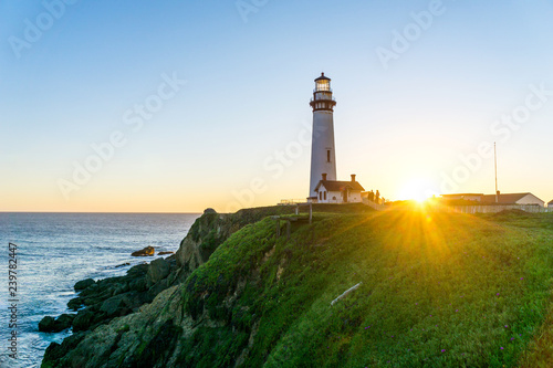 Sunset at Historic Lighthouse - Pigeon Point Lighthouse - California, USA photo