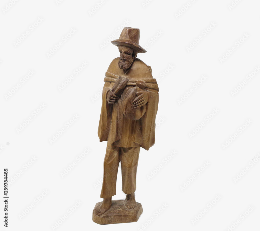 Carved wooden figurine of barefoot bearded peasant with hat and small sack - Ecuador