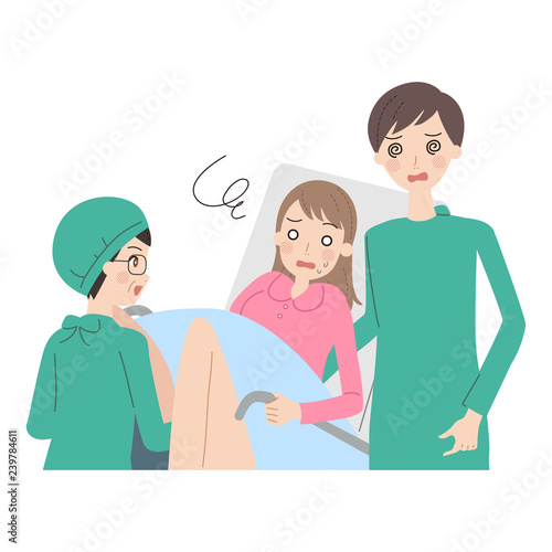 出産する女性。